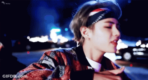 Person Wearing Headband And Jacket GIF