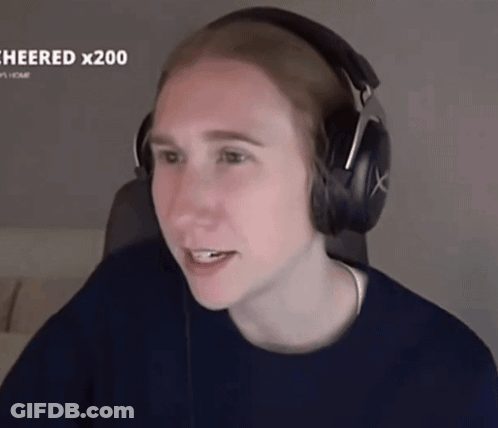 Person Wearing Headphones And Beanie Smiling GIF