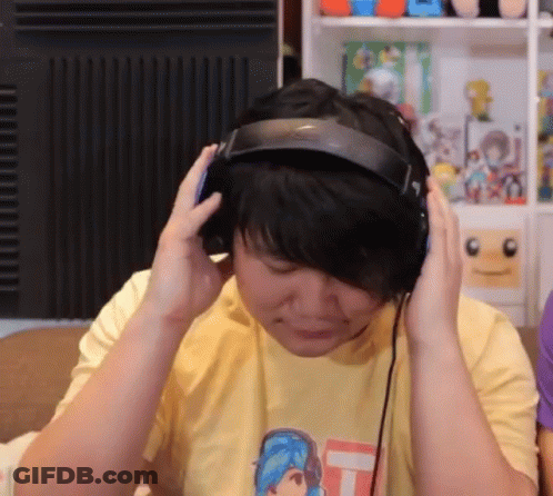 Person Wearing Headphones And Yellow Shirt GIF