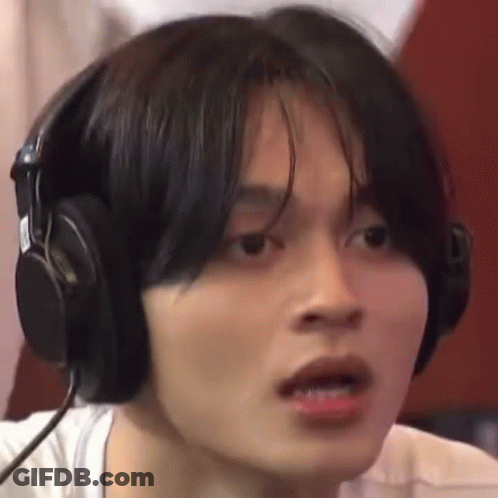 Person Wearing Headphones Making Face GIF
