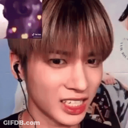 Person Wearing Headphones Making Face GIF