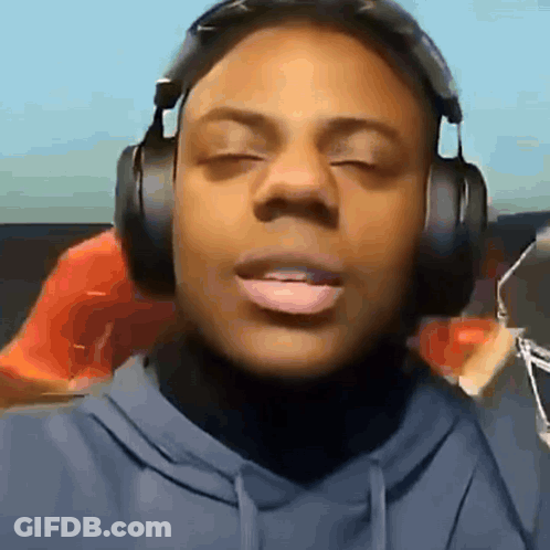 Person Wearing Headphones With Eyes Closed GIF