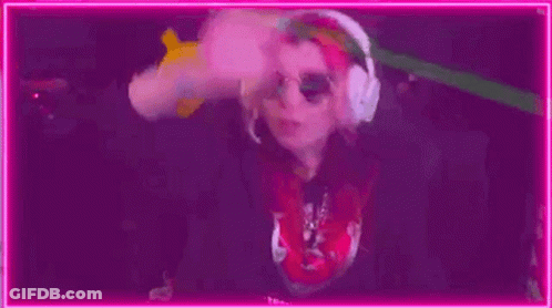 Person Wearing Headphones With Pikachu In Background GIF