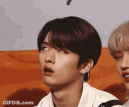 Person Wearing Hoodie And Necklace GIF