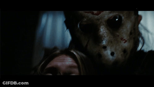 Person Wearing Jason Voorhees Mask GIF