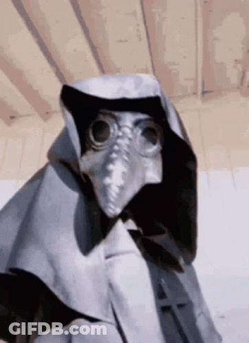 Person Wearing Mask Goggles And Cape GIF