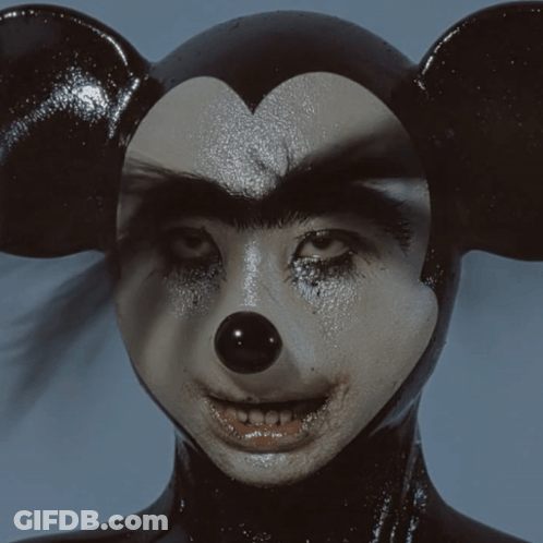 Person Wearing Mickey Mouse Mask GIF