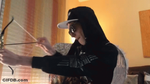 Person Wearing Moschino Hoodie GIF