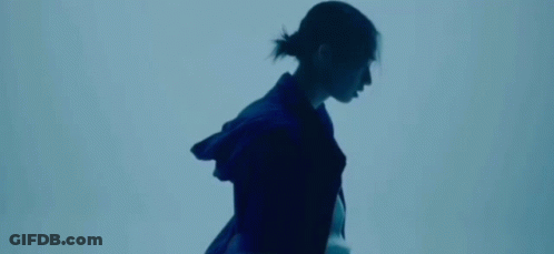 Person Wearing Necklace And Purple Jacket GIF