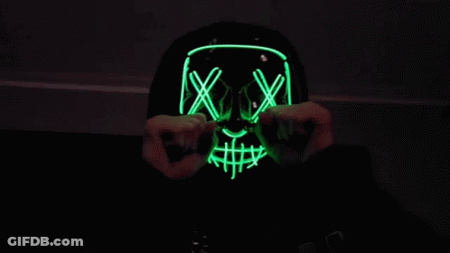 Person Wearing Neon Skull Mask GIF