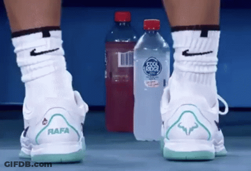 Person Wearing Nike Shoes With Rafa On Back GIF