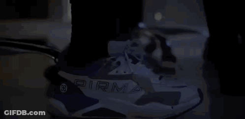 Person Wearing Pirma Blue And White Sneakers GIF