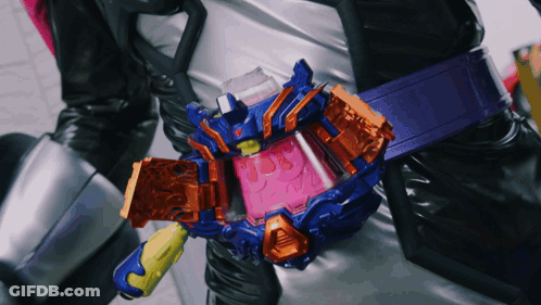 Person Wearing Purple Belt With Orange Item GIF
