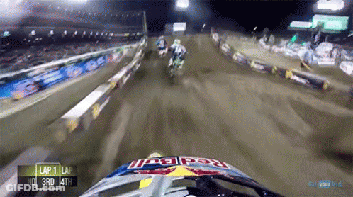 Person Wearing Red Bull Helmet During Race GIF
