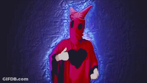 Person Wearing Red Horned Mask GIF