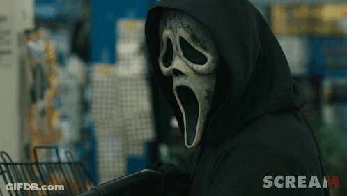 Person Wearing Scream Mask And Black Hood GIF