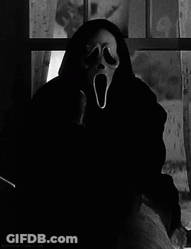 Person Wearing Scream Mask At Window GIF