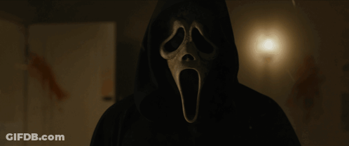 Person Wearing Screaming Mask GIF