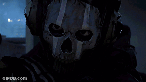 Person Wearing Skull Mask With Headphones GIF