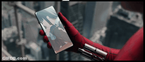 Person Wearing Spiderman Glove Holding Phone GIF