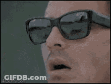 Person Wearing Sunglasses GIF