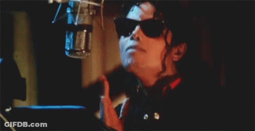 Person Wearing Sunglasses And Microphone GIF
