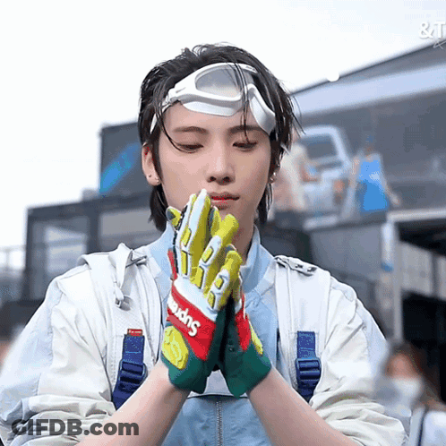 Person Wearing Supreme Headband And Gloves GIF