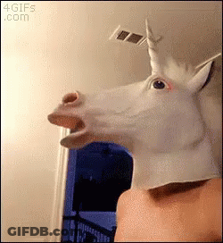 Person Wearing Unicorn Mask With Open Mouth GIF