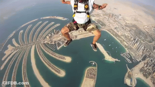 Person Wearing Vis Helmet Flying Through Air GIF