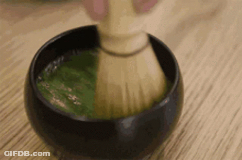 Person Whisking Green Tea GIF
