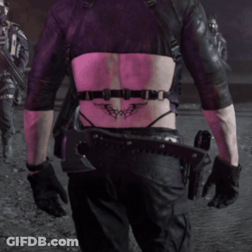 Person With Back Tattoo Saying X GIF
