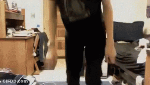 Person With Backpack In Room GIF