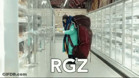 Person With Backpack Walking Through Grocery Store Rgz GIF