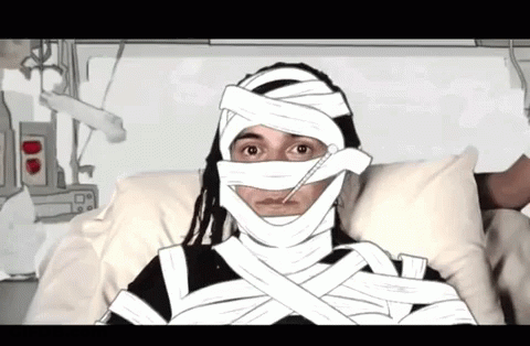 Person With Bandages On Face And Thermometer In Mouth GIF