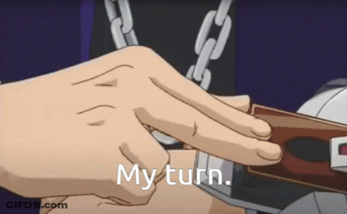 Person With Chains Holding My Turn Card GIF