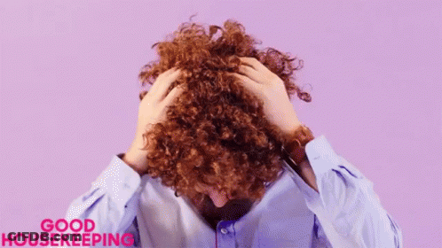 Person With Curly Hair Scratching Head GIF