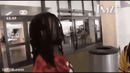 Person With Dreadlocks In Front Of Door Saying L1-10 GIF