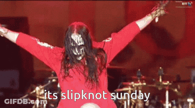 Person With Dreadlocks Singing Into Microphone GIF
