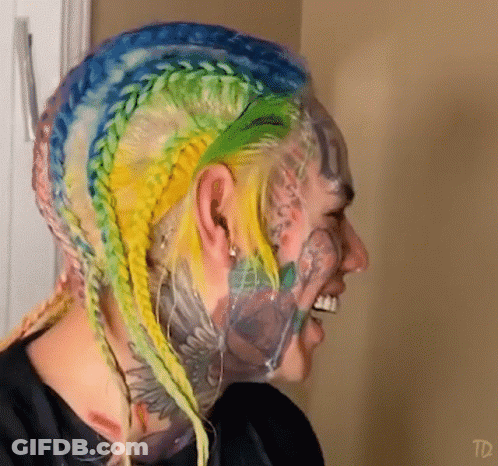 Person With Face Tattoos And TD Text GIF