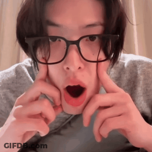 Person With Glasses Making Funny Face GIF