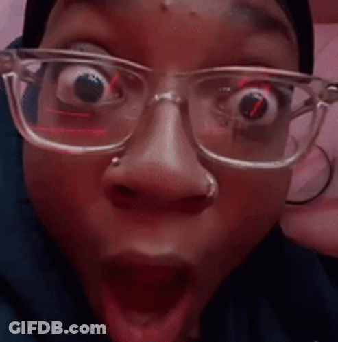Person With Glasses Open-Mouthed Funny Face GIF