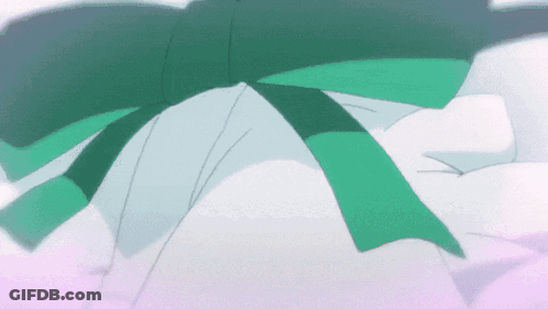 Person With Green Bow Around Neck GIF