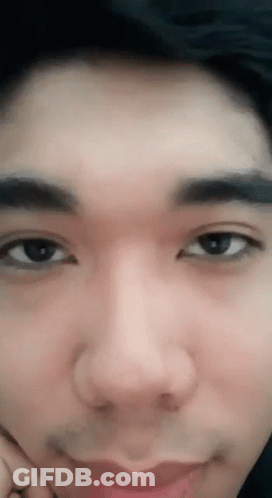 Person With Hand On Chin GIF