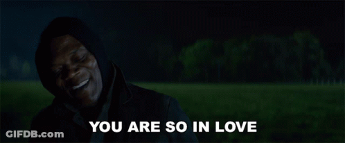 Person With Hearts Around Head GIF