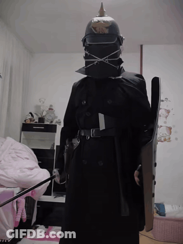 Person With Helmet And Shield GIF