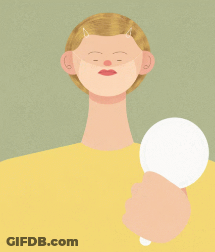 Person With Horns Holding White Object GIF