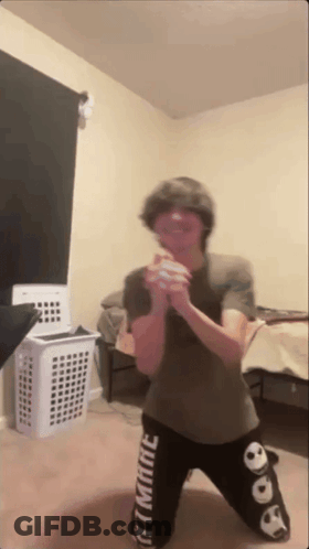 Person With Laundry Basket Wearing Ultimate Pants GIF