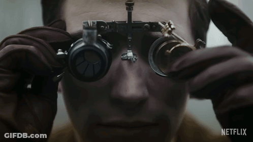 Person With Magnifying Glasses Netflix GIF