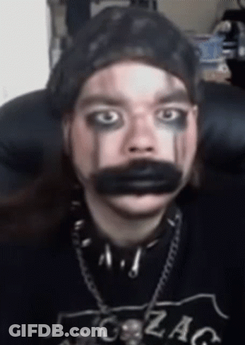 Person With Makeup And Gzag Shirt GIF