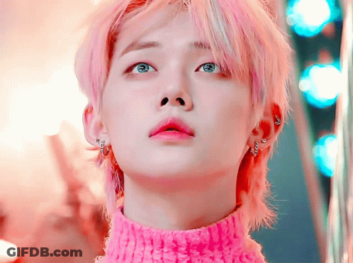 Person With Pink Hair And Pink Sweater GIF